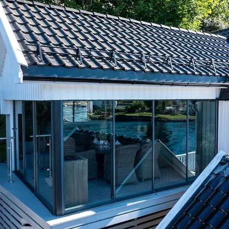 Holiday home Luxurious Boathouse With Private Dock In The Location In *